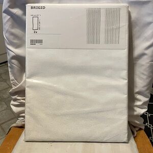 New , still in packaging. IKEA  set of 2 white drapes with starlike designs